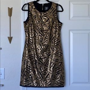 Gold and black cocktail dress